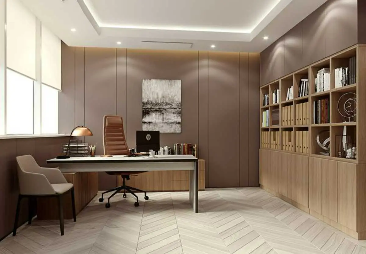 دفتر وکالت کوچک با کتابخانه قهوهای روشن، کفپوش طوسی، میز و مبل سفید، صندلی قهوهای و نورپردازی