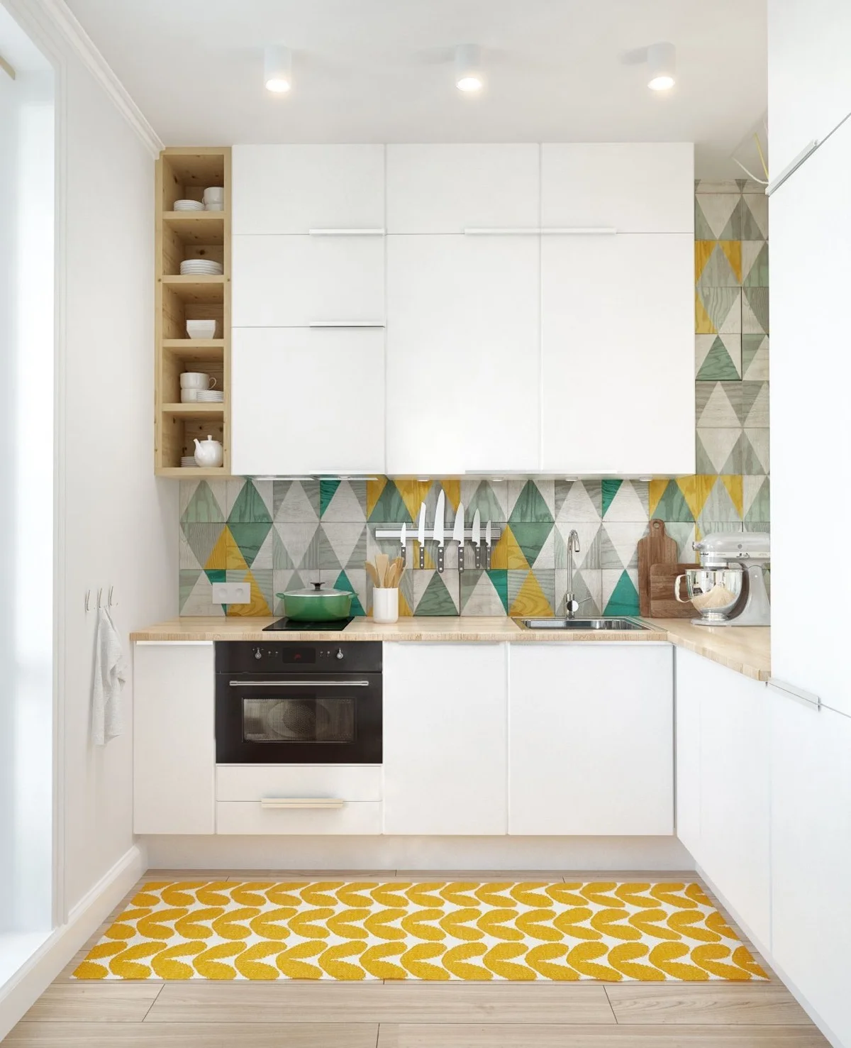 آشپزخانه دارای کابینت سفید تا سقف و کاشیهای پشت کابینتی رنگی